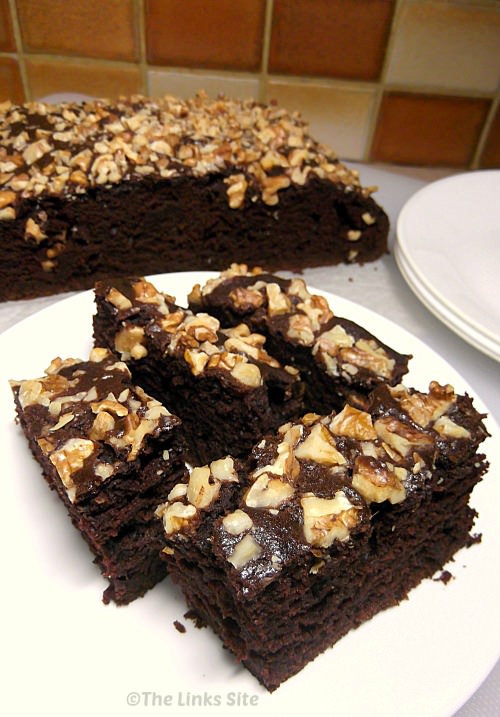 This chocolate walnut cake is beautifully moist and has just the right amount of chocolate! thelinkssite.com