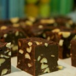 Squares of fudge on baking paper.