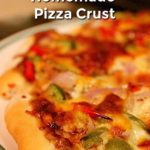 Slices of pizza on a round pizza plate. Text overlay says: Quick & Easy Homemade Pizza Crust.