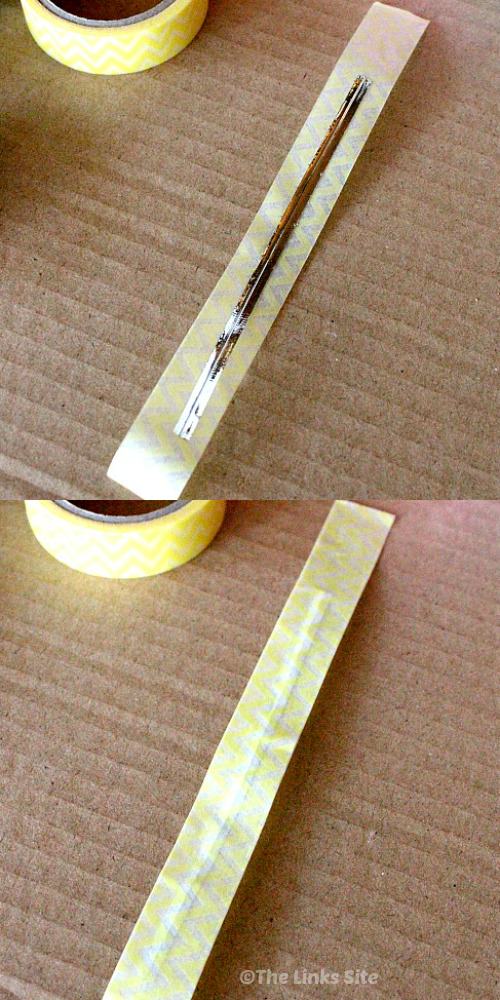 Collage with two photos. Top image shows how a twist tie has been placed onto the sticky side of a piece of washi tape. The bottom image shows another piece of washi tape has been added to sandwich to twist tie in the middle.