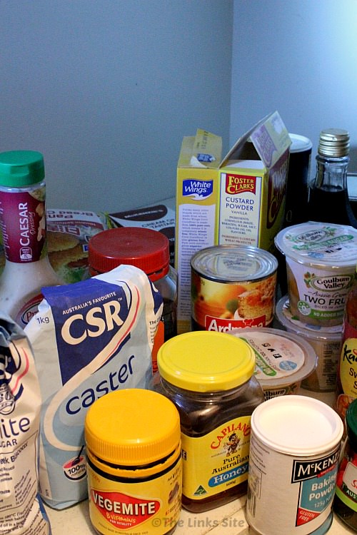 Group of pantry items on shelf. 