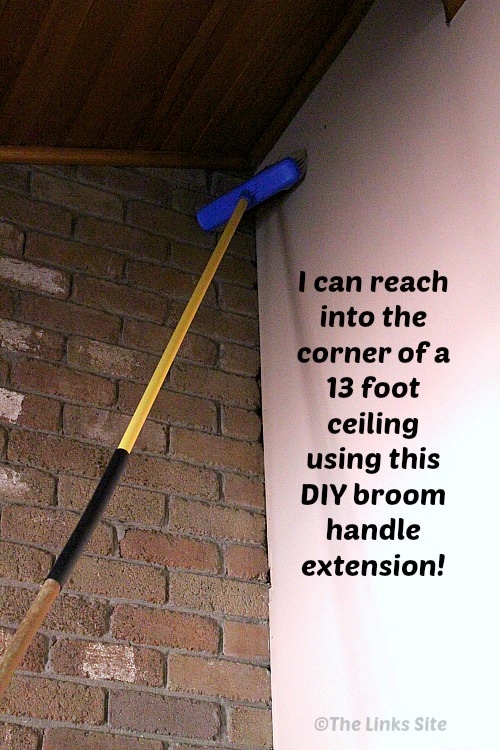 Extended broom is shown reaching up into a high corner of a room. Text overlay says: I can reach into the corner of a 13 foot ceiling using this DIY broom handle extension!