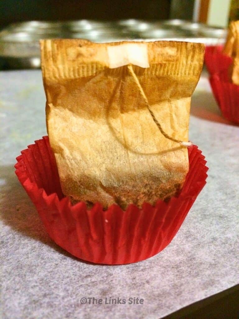 Image shows a homemade firelighter cooling on baking paper.